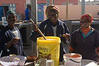 Ladies Selling the fresh beer (oshikundu) (Greg Willis, Wikimedia Commons)